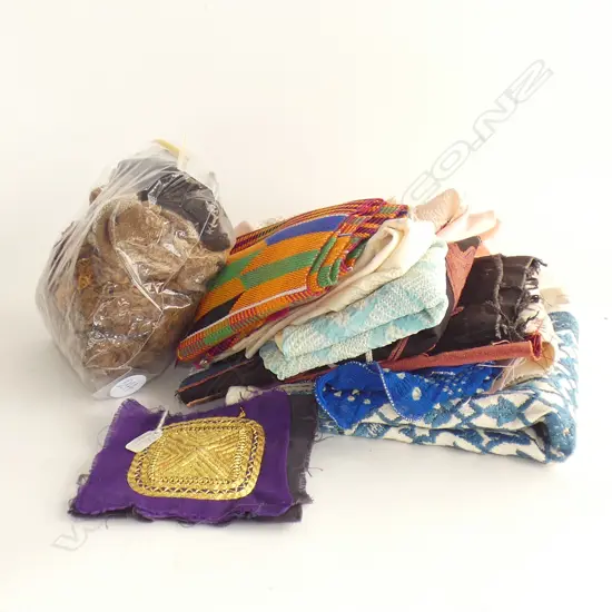 Assorted fabric including three Japanese shiboro lengths, two Middle Eastern embroidered panels, two suzani pieces etc.